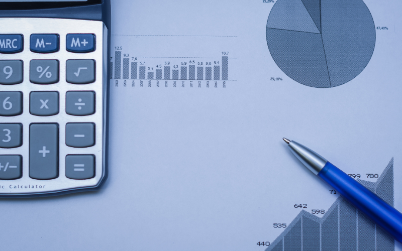 Pen and calculator on a desk