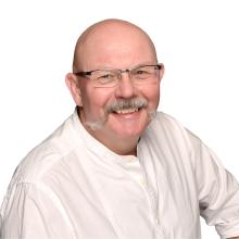 Headshot photograph of Chris Bolton