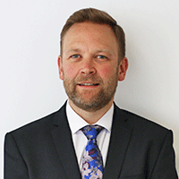 Headshot photograph of Matthew Edwards